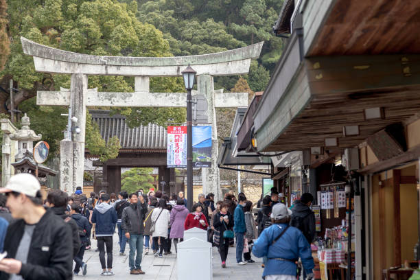 Many Tourists are walking and shopping at Dazaifu main street before go to Dazaifu Tenmangu shrine in Fukuoka prefecture, Japan. stock photo