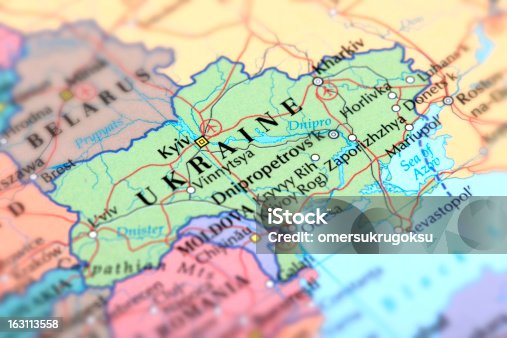 istock Map of green Ukraine on a globe 163113558