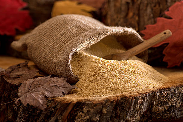 Maple Sugar A burlap bag of delicious natural maple sugar in a maple forest setting. maple tree stock pictures, royalty-free photos & images