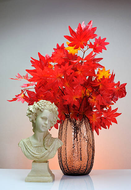 Maple vase with replica resin sculpture  vudhikrai stock pictures, royalty-free photos & images