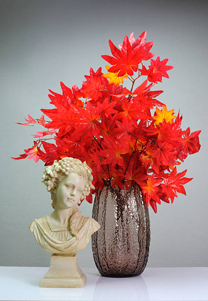 Maple vase with replica resin sculpture  vudhikrai stock pictures, royalty-free photos & images
