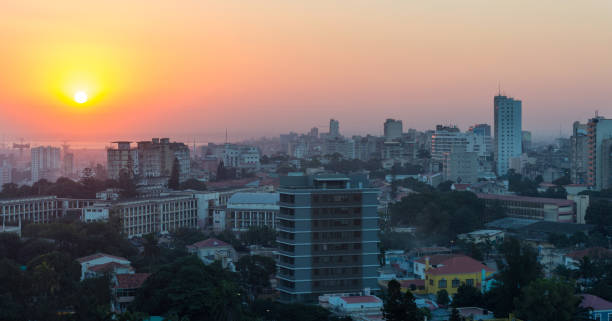 Maputo skyline at dusk Dusk view of Maputo, Mozambique, from elevated position maputo city stock pictures, royalty-free photos & images
