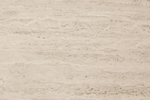 marmer kalksteen textuur achtergrond in beige bruin crème sepia kleur - kalksteen stockfoto's en -beelden