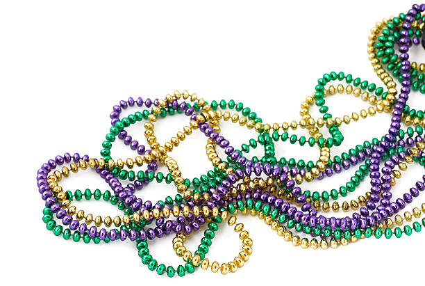 Mardi Gras beads mardi gras beads isolated on white bead stock pictures, royalty-free photos & images