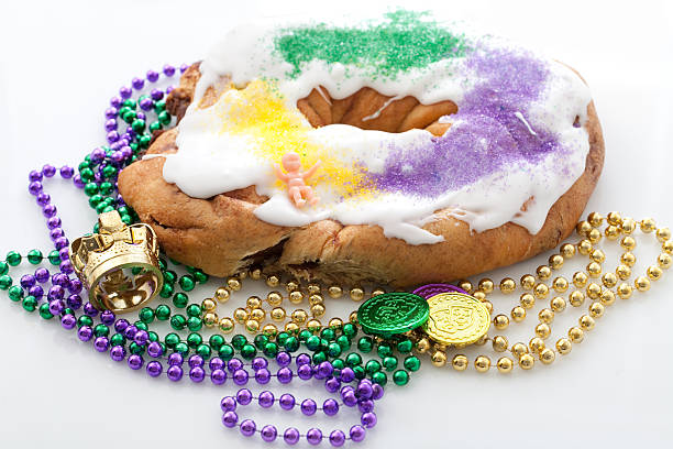 Mardi Gras king cake with beads  stock photo