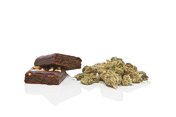 Marijuana cannabis and brownies isolated on white stock photo