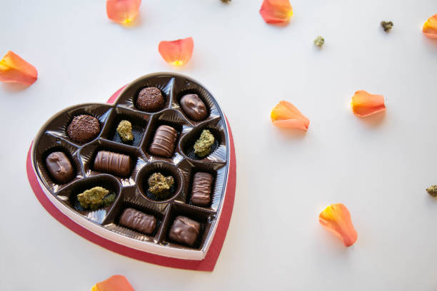 Marijuana Valentine's Day Chocolate Box with Cannabis Buds stock photo