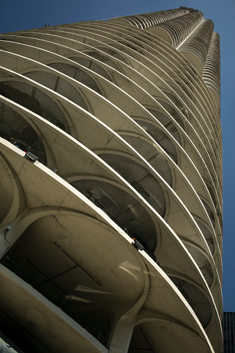 Chicago, Illinois: Low angle vertical shot of one of the Marina City towers from an unusual point of view
