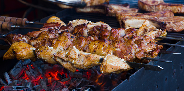 Marinated Shashlik Preparing On A Barbecue Grill Over Charcoal Stock ...