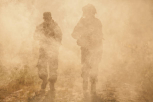 US Marines in action. Desert sandstorm stock photo