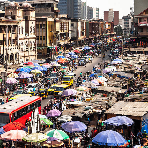Market streets. Lagos, Nigeria. Lagos Island's commercial district. lagos nigeria stock pictures, royalty-free photos & images