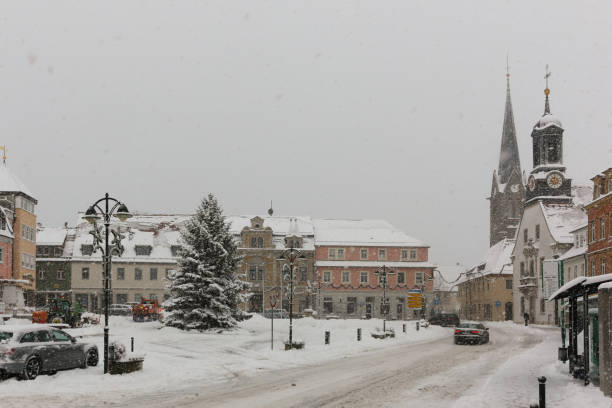 Marketplace of a small town in Saxony with a lot of snow in winter stock photo