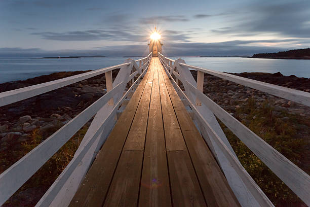 Marshall Point Lighthouse at sunset, Maine, USA stock photo