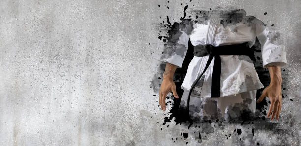 Martial arts master on wall background stock photo