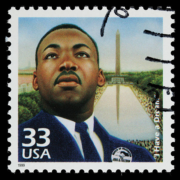 USA Martin Luther King Jr postage stamp Sacramento, California, USA - March 19, 2011: A 1999 USA postage stamp with an image of Martin Luther King, Jr (1929-1968). King is depicted wearing a badge that reads: MARCH ON WASHINGTON FOR JOBS &amp;amp;amp;amp;amp;amp;amp;amp;amp; FREEDOM, and in the background is the Washington Memorial and a large crowd of people. The stamp commemorates the August 28, 1963 demonstration in Washington, D.C. in which King delivered his historic &amp;amp;amp;amp;amp;amp;amp;amp;quot;I Have a Dream&amp;amp;amp;amp;amp;amp;amp;amp;quot; speech. martin luther king jr stock pictures, royalty-free photos & images