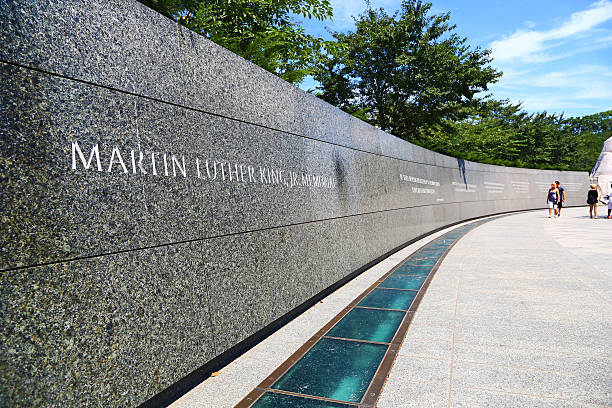 Martin Luther King Memorial in Washington D.C. Washington D.C., USA - August 15, 2015: A wall in Martin Luther King Jr. Memorial. Far are visible some people. mlk memorial stock pictures, royalty-free photos & images