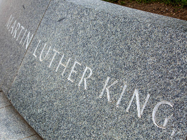 Martin Luther King Memorial Washington DC, USA - June 26, 2015: A close up of the name Martin Luther King engraved in a marble or Granite wall at the memorial in Washington DC. No people can be visible. mlk memorial stock pictures, royalty-free photos & images