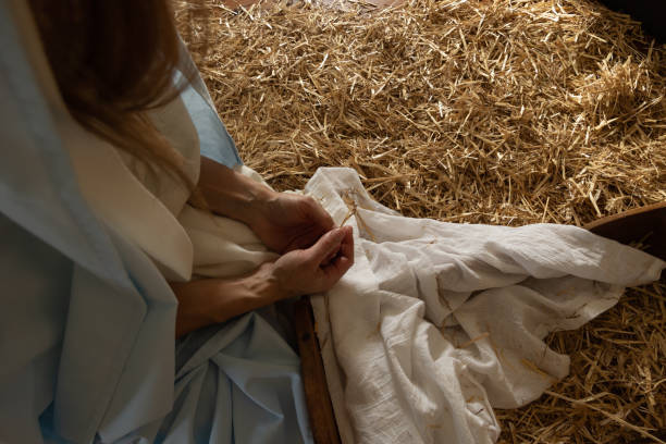 Mary by the manger stock photo