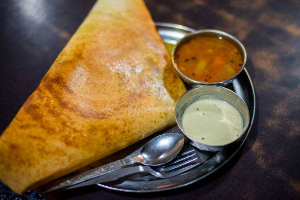 masala sin masala dosa indian food in restaurant thosai stock pictures, royalty-free photos & images
