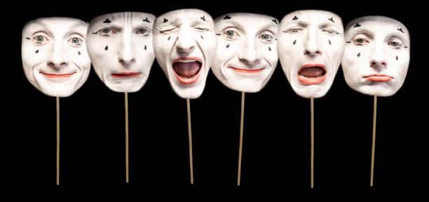 Masks with different emotions Masks with different emotions of pantomime on the black background mime artist stock pictures, royalty-free photos & images