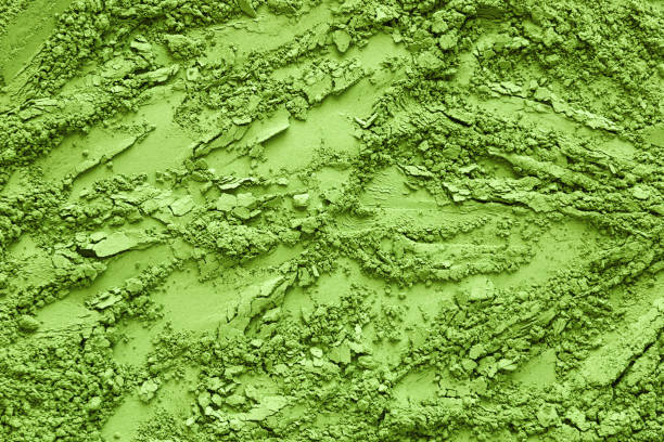 Matcha powder texture background, closeup stock photo