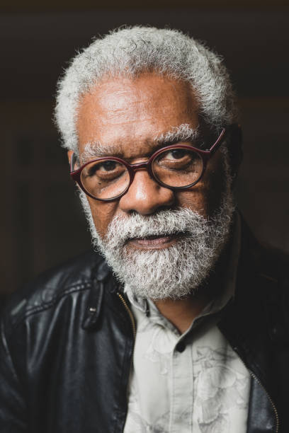 Mature African American man in glasses-Photo of head Mature African American man in glasses-Photo of head pardo brazilian stock pictures, royalty-free photos & images