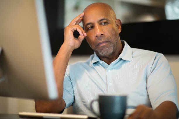 Mature African American man looking frustrated. African American man dealing with depression and sad. sad old black man stock pictures, royalty-free photos & images