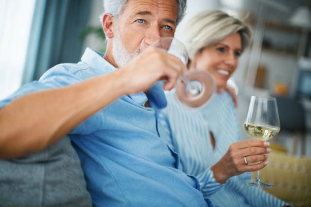 Mature couple enjoying and relaxing together. stock photo