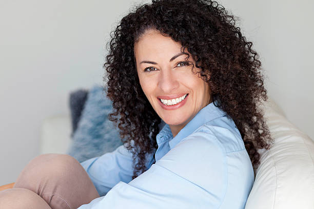 Mature Ethnic Woman Smiling At The Camera stock photo