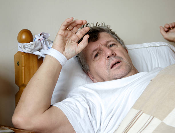 Man Tied To Bed