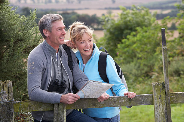 Mature white couple on a walk in the country stock photo