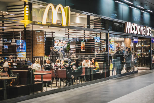 McDonalds and McCafe fastfood restaurant inside train stration (Berlin Hauptbahnhof) stock photo