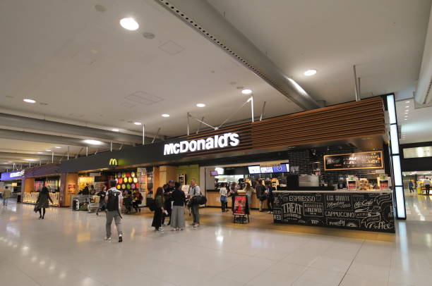 McDonalds fast food restaurant Japan Osaka Japan - November 14, 2018: Unidentified people dine at McDonalds fast food restaurant at Kansai airport Osaka Japan mcdonalds japan stock pictures, royalty-free photos & images