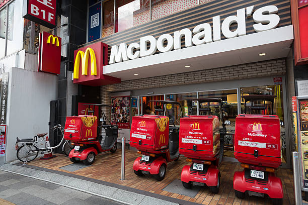 McDonald's restaurant in Japan Tokyo, Japan - August 15, 2016 : McDonald's restaurant in Bunkyo ward, Tokyo, Japan. Some customers inside the McDonald's restaurant.  mcdonalds japan stock pictures, royalty-free photos & images