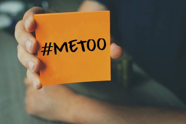Me Too hashtag on orange note paper , anti sexual harassment social media campaign Me Too hashtag on orange note paper , anti sexual harassment social media campaign me too social movement stock pictures, royalty-free photos & images