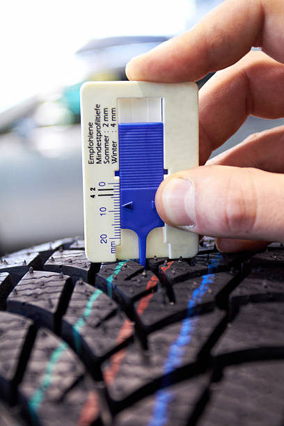 measurement of tire wear stock photo