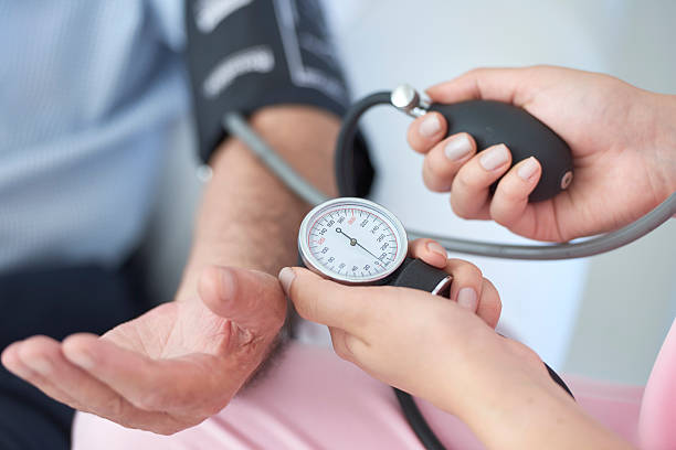 Measuring blood pressure stock photo