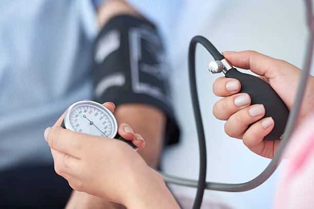 Measuring blood pressure stock photo