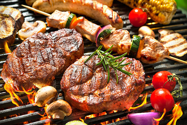 meat and grilled vegetables stock photo