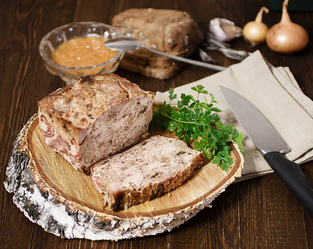 Meat pate for dinner Terrine is a hearty meat dish for dinner casserole dish stock pictures, royalty-free photos & images