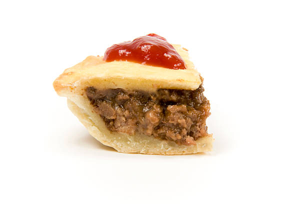 meat pie with sauce stock photo