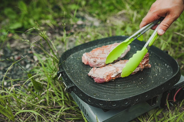 meat steak is fried in grill pan on gas stove in open air hand turns picture id1326066022?k=20&m=1326066022&s=612x612&w=0&h=r0M67xnvtL9iQ48bwJuBP58vnP54 - The Tasty Hub