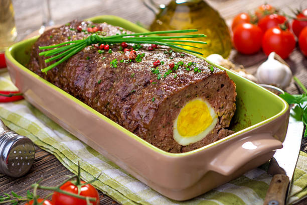 meatloaf with boiled eggs - meat loaf bildbanksfoton och bilder