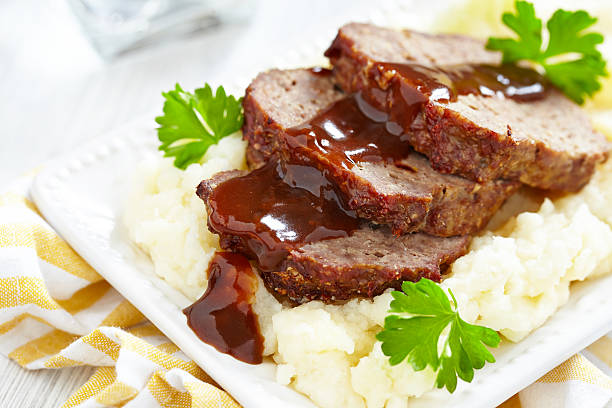 meatloaf with brown sauce - meatloaf 個照片及圖片檔