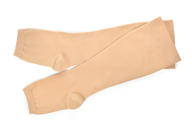 Medical compression stockings on white background. stock photo