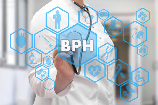 Medical Doctor and BPH, Benign Prostatic Hyperplasia words in Medical network connection on the virtual screen on hospital background. stock photo