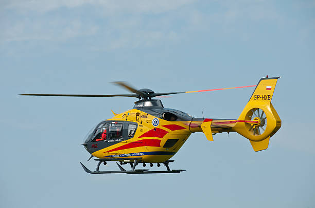 Medical helicopter Eurocopter in flight over Goraszka stock photo