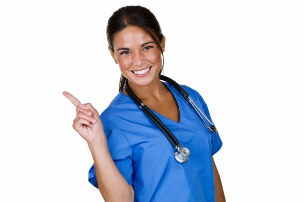 Medical personnel pointing to copy space stock photo