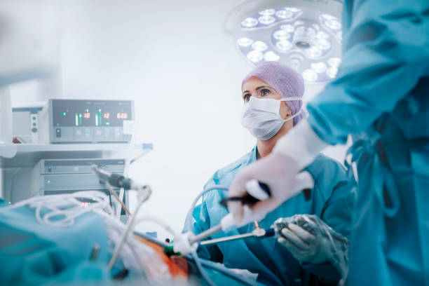 Medical team performing gastric bypass surgery stock photo
