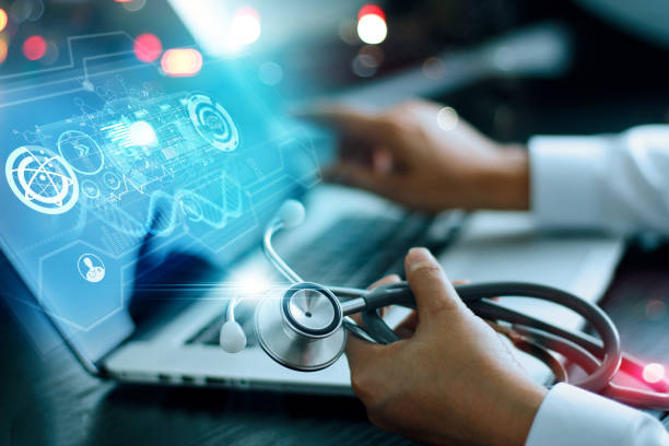 Medicine doctor analysis and diagnosis checking health of patient online and testing result with modern virtual interface on laptop with stethoscope in hand, Online Medical global network concept. stock photo
